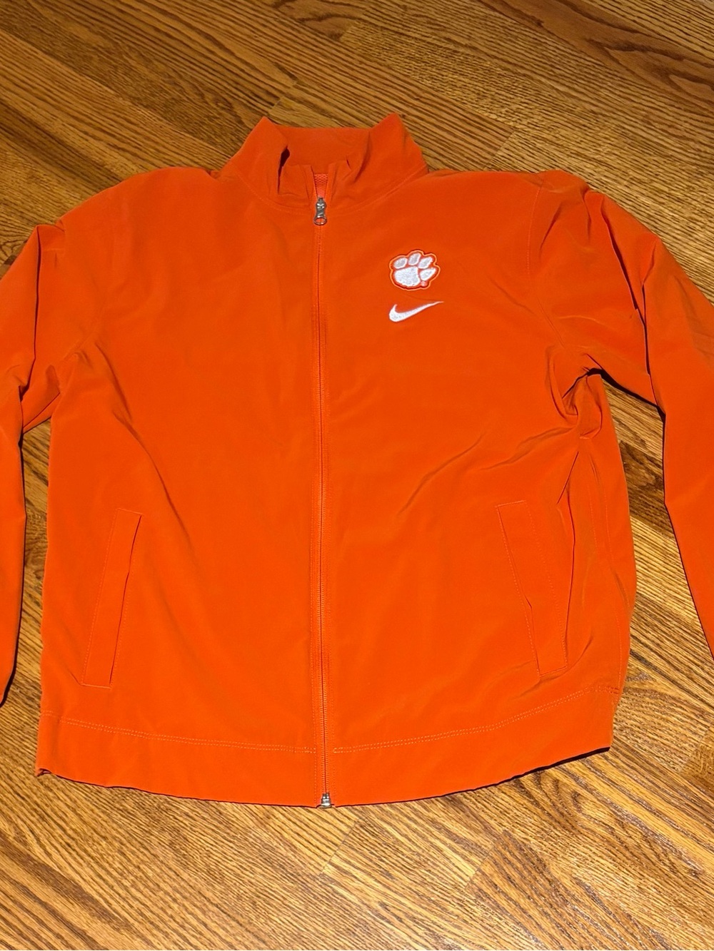 Clemson Nike Womenโs Orange Full-Zip Jacket with Paw & Swoosh